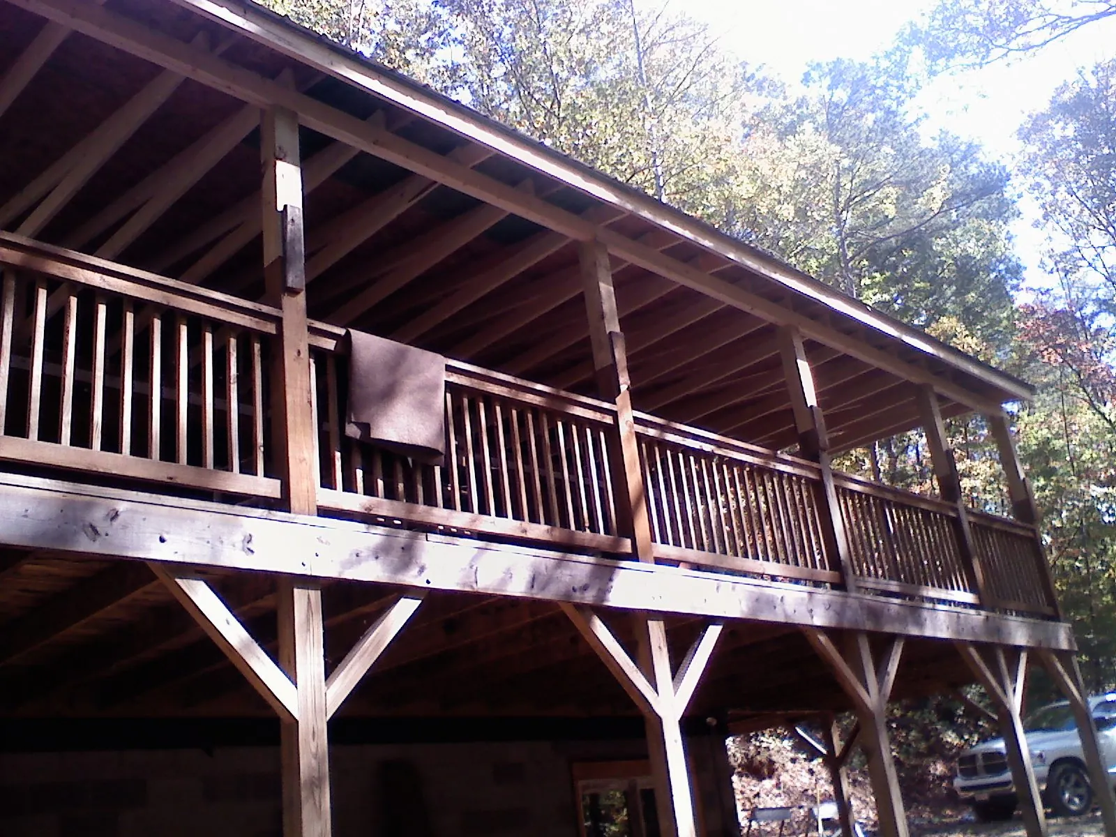 Timber framing under a new elevated porch and deck — Roof Leak Repair in South San Francisco by Roofing Brothers