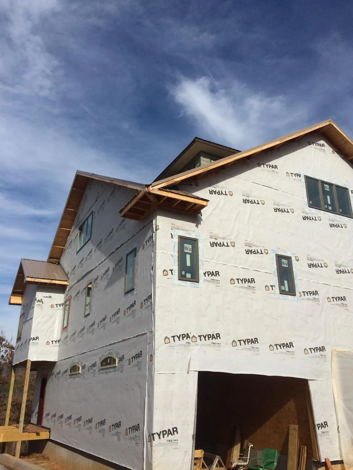 Stick built house wrapped in Typar with new roof framing and dormers in South San Francisco